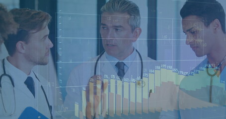Observing medical team analyzing bar charts in meeting room, with digital display and stethoscopes