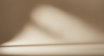 Abstract beige wall with soft light shadows for background or product display