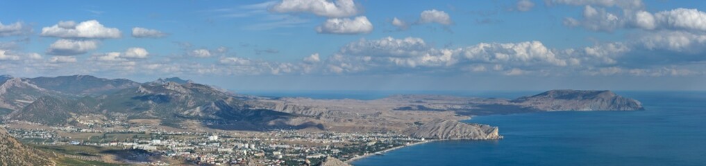 Panorama along Sudak coastline from Sokol Mountain, Crimea, Russia.