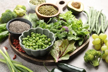 Superfood. Different healthy products on grey table, closeup