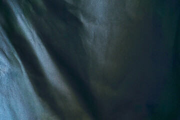 black cloth background abstract with soft waves