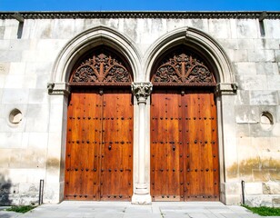 Ornate wooden doors in a stone wall