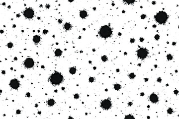 Abstract black ink splatters on a clean white background