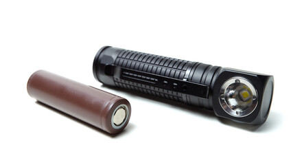 Battery pack and led flashlight isolated on white background.