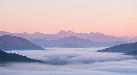 Misty Mountain Sunrise Panorama: Majestic Peaks Bathed in Soft Light Above a Sea of Clouds in the Valley Below.