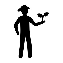 Silhouette of a farmer holding a young plant, showing care and agriculture