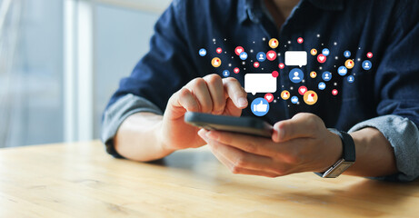 slow motion scene young man hand use smartphone to check news feed from social media network application while sitting in cafe at relaxing time for city lifestyle concept