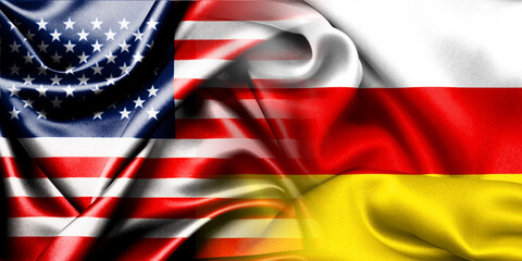 The national flags of the United States and South Ossetia are combined into one and placed side by side on a fluttering cotton background. Flags.