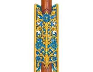 Ornate wooden pillar with floral carvings