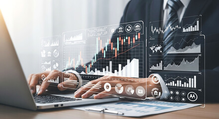 Businessman analyzing financial data on laptop with digital interface overlaying information graphs