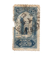 A vintage postage stamp from Morocco isolated on a white background.