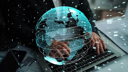 A business professional works on a laptop while a digital globe representation highlights global connectivity and technology in modern work environments, symbolizing innovation. Xenic - Powered by Adobe