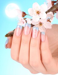 Soft pastel nails with delicate flowers