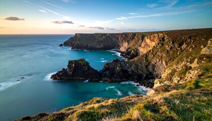 Fototapeta premium Breathtaking Coastal Scene with Rugged Cliffs and Tranquil Turquoise Waters