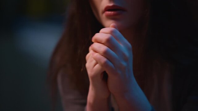 Cropped view woman upset at home night worry holding hands pray hope thoughtful sad female housewife frustrated trouble girl worried breakup psychology problem stress crisis anxious mental depression