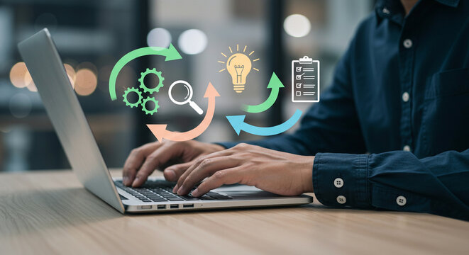 Businessman using laptop to manage project progress