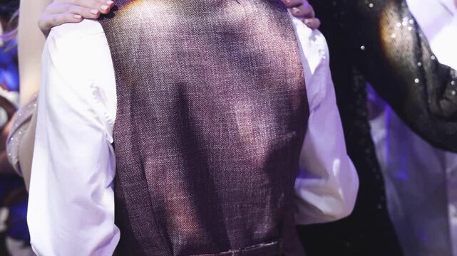 High school graduates dancing on prom, waltz and classical ball dance in dresses and suits on school graduation party, girls and boys classical ballroom dancers, couples dance quadrille and polonaise