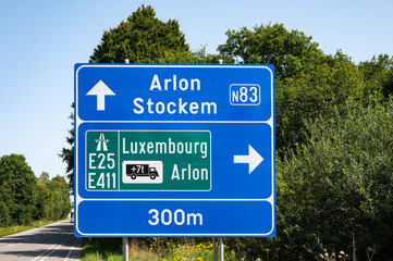 Road sign to the N 83 and E 25 E 411 highway in  Arlon, Province de Luxembourg, Belgium