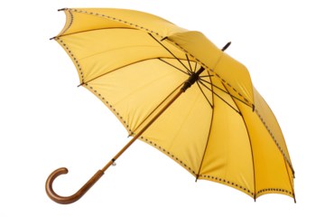A classic yellow umbrella with a wooden handle and ornate trim, perfect for rainy days, offering protection and style against the elements