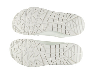 White rubber soles of a pair of sneakers isolated on a white background