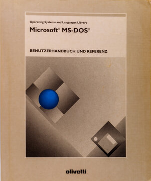 MS-DOS User Manual Cover with Geometric Design