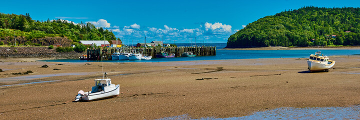 Lobster Trawlers at low tide near Sandy Cove, Nova Scotia Canada.