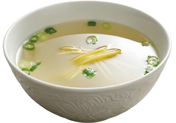 Creamy, light soup in a white bowl, garnished with delicate slices of ginger and scallions, showcasing a soft, inviting visual appeal.