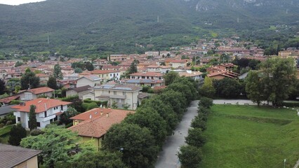 Aerial view of the town of Botticino Sera, Brescia, Italy with green fields and from above with a drone