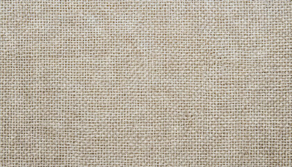 Fototapeta premium A close-up view of a textured fabric in soft neutral tones, ideal for upholstery or crafting, showcasing intricate weaves and fibers under natural light