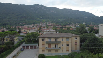 Aerial view of the town of Botticino Sera, Brescia, Italy with green fields and from above with a drone