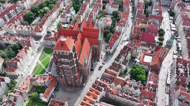 Aerial Gdansk Poland Cathedral to river 4K. Baltic coast of northern Poland. World War II started here with German invasion. Economic international port. Historical buildings, tourism.