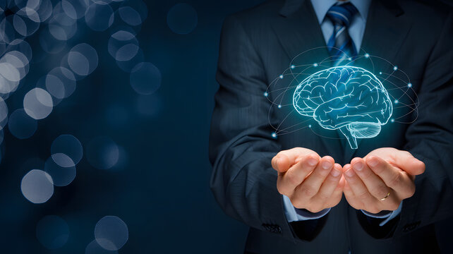 Businessman presents innovative brain concept with glowing neural network held carefully