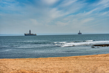 oilrig in the ocean, offshore petrol platform, Swakopmund jetty , Namibia, Atlantic ocean, petrol rig floating at sea