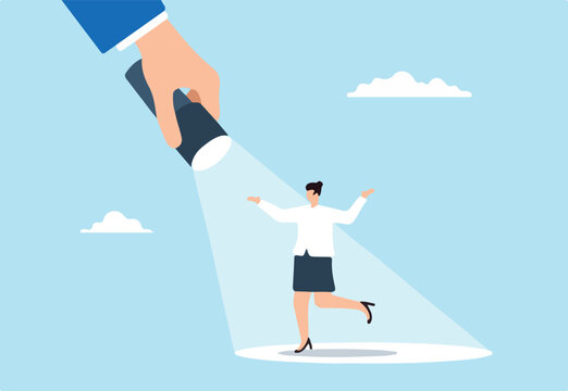 Businesswoman stands in bright spotlight, illustrating successful candidate for a job vacancy. Concept of outstanding performance, ambition, opportunities, and making ideal choice for job position