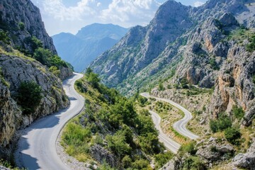 Mountain pass road with steep cliffs