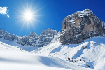 Naklejka premium High snowy mountains with rocky peaks