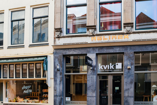 Haarlem, Netherlands - Aug 30, 2024: Street view of Haarlem, Netherlands, featuring a kvik store with signage Keuken Badkamer Garderobe and Sogno di Pasta restaurant with pasta displays