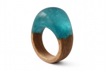Handcrafted wooden ring featuring turquoise resin gemstone, showcasing natural elegance against transparent backdrop