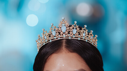 blue princess crown on a beautiful young woman © Marco