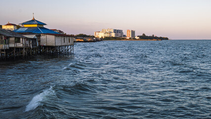 Balikpapan Coastal Housing and Waterfront Skyline and Mall at Sunset