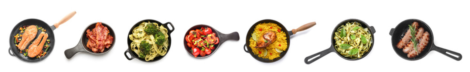 Set of frying pans with different cooked dishes on white background, top view