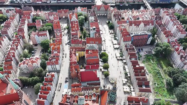 Aerial Gdansk Poland historic river pull 4K. Baltic coast of northern Poland. World War II started here with German invasion. Economic international port. Historical buildings, tourism.