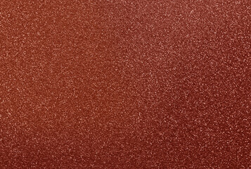 Fototapeta premium Auburn rust red glitter background, shiny sparkling rust-colored glitter particles, textured metallic-russet red effect for website marketing and social media, abstract sparkles, flame shimmer sequins