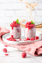 Pair of homemade raspberry chia seed puddings