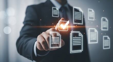 A businessman's finger touches a glowing checkmark within a digital interface showing multiple document icons representing data management and approval processes