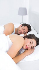 Couple sleeping peacefully in bed