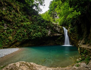 Fototapeta premium Lush waterfall cascading into a tranquil pool (3)