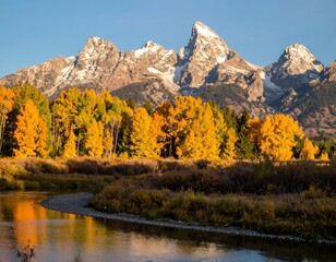 Grand Teton Mountains Reflecting in Snake River During Autumn.