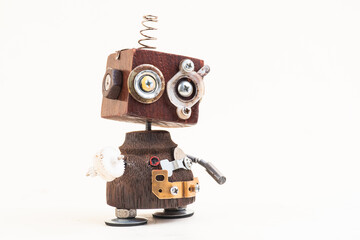 Wooden robot toy on isolated background