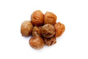 Pickled plums on white background.